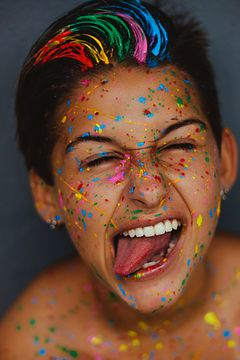 woman-s-face-with-color-splatters-1937301.jpg
